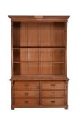 A Continental walnut bookcase cabinet