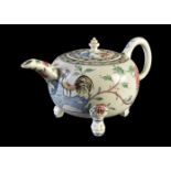 A Staffordshire salt-glazed stoneware polychrome teapot and cover