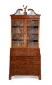 A George III mahogany and crossbanded bureau bookcase