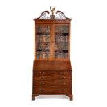 A George III mahogany and crossbanded bureau bookcase