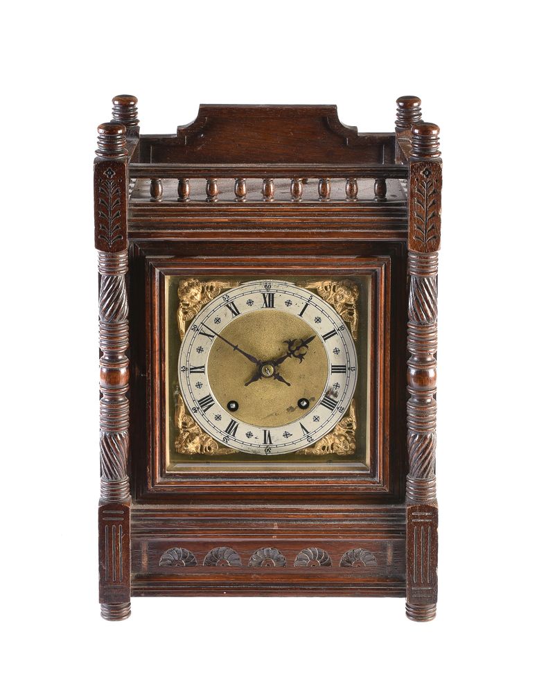 An oak cased mantel clock in Aesthetic taste