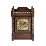 An oak cased mantel clock in Aesthetic taste