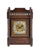 An oak cased mantel clock in Aesthetic taste