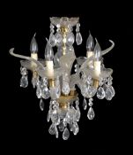A Murano moulded and cut clear glass four light chandelier