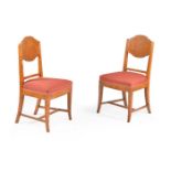 A set of eighteen Baltic karelian birch dining chairs