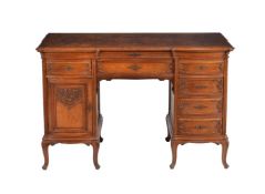 A Continental walnut and figured walnut kneehole desk