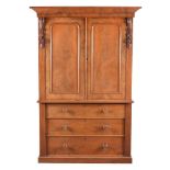 A Victorian flame mahogany linen press