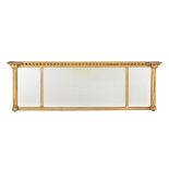 A Regency giltwood and composition overmantel mirror