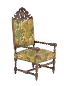 A Caroleon Revival walnut and upholstered armchair