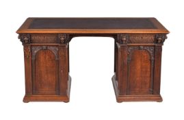 A carved oak twin pedestal desk in 17th century style