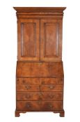 A George II walnut bureau bookcase