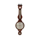 A mahogany wheel barometer