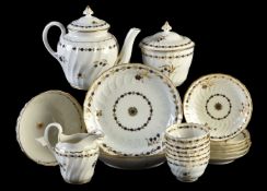 A Worcester (Barr) porcelain part tea service decorated in blue and gilt