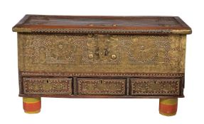 A Zanzibar metal mounted and studded hardwood coffer