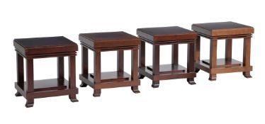 After Frank Lloyd Wright, four dark wood occasional tables by Cassina