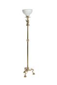 A gilt metal standard lamp in the manner of Pompeian Revival examples by Chiurazzi of Naples