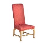 A George I giltwood and upholstered high back chair