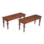 A pair of oak hall benches in Victorian style