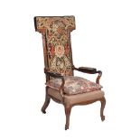 ϒ An early Victorian rosewood and needlework upholstered open armchair