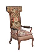 ϒ An early Victorian rosewood and needlework upholstered open armchair