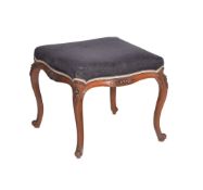 A Victorian walnut and upholstered stool