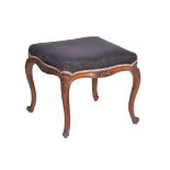 A Victorian walnut and upholstered stool