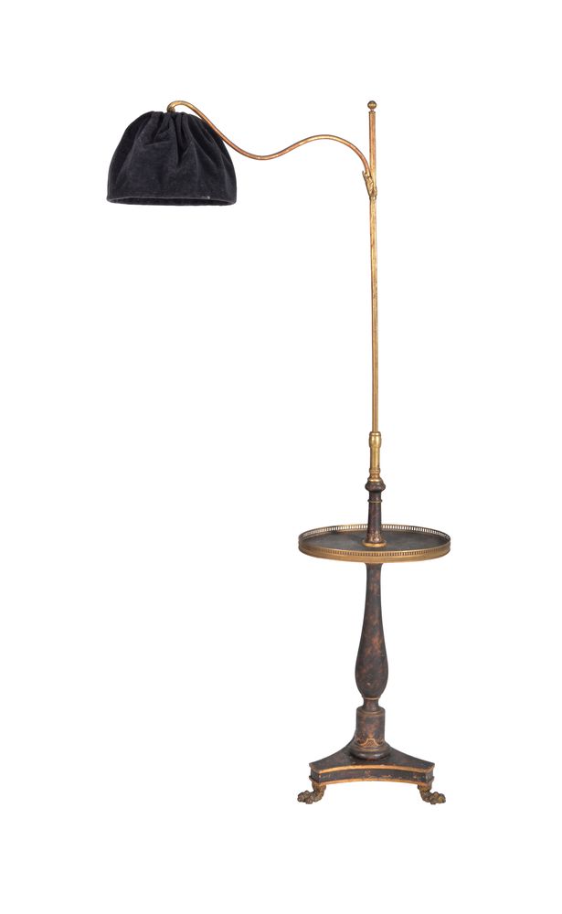 A Chinoiserie black lacquered and brass standard reading lamp