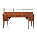 A George III mahogany and line inlaid sideboard