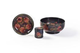 Pomegranate, three Moorcroft Pottery items