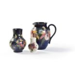 Orchid, three Moorcroft Pottery items