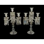 Baccarat, a pair of four light cut and moulded glass candelabra