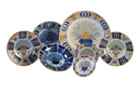 A selection of seven various polychrome and blue and white Dutch Delft 'Peacock' pattern plates