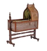 A Victorian mahogany and canework rocking cradle