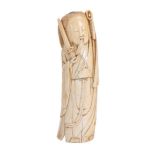ϒ A Chinese ivory figure of an immortal