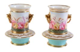 A pair of English porcelain two-handled cylindrical spill vases with annular basal sections