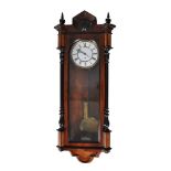 ϒ A Vienna style rosewood, walnut, and parcel ebonised regulator wall timepiece