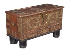 A Zanzibar metal mounted and studded hardwood coffer