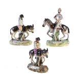 A pair of Staffordshire pottery equestrian figures of Thomas Parr type of Don Quixote and Sancho Pan