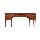 A George III mahogany and line inlaid sideboard