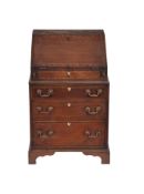 A mahogany bureau in George III style