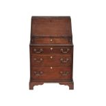 A mahogany bureau in George III style