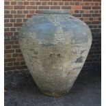 A substantial glazed stoneware garden pot or urn
