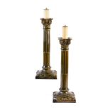 A pair of Burmantofts majolica Corinthian Column candlesticks