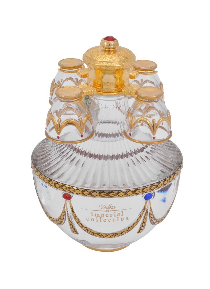 Fabergé Art's Applied Craft Ltd., The Imperial Collection, a gilt metal and faux agate egg shaped de