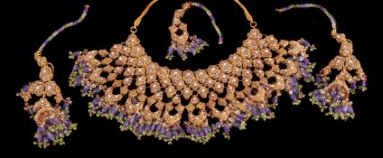 A gold coloured multi gem set suite of jewellery