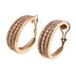 A pair of diamond ear hoops