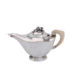 ϒ An Italian hammered silver oval tea pot by Luigi Genazzi