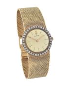Corum, Ref. 5804, Lady's 18 carat gold and diamond bracelet watch