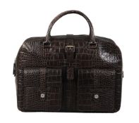 ϒ Dunhill, a brown crocodile bag