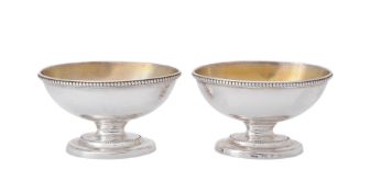 A pair of George III silver pedestal oval salt cellars by William Abdy I